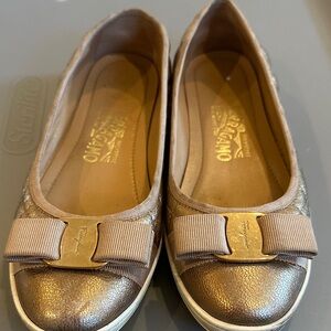 Salvatore Ferragamo Gold Flats with Bow Accent